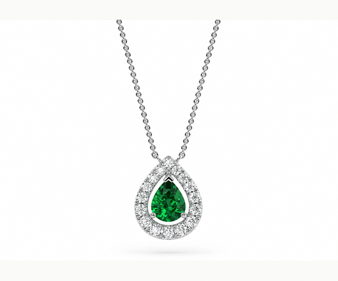 Bahía Solano · Dije con esmeralda colombiana pera y halo de diamantes — Blanco — Foto 1