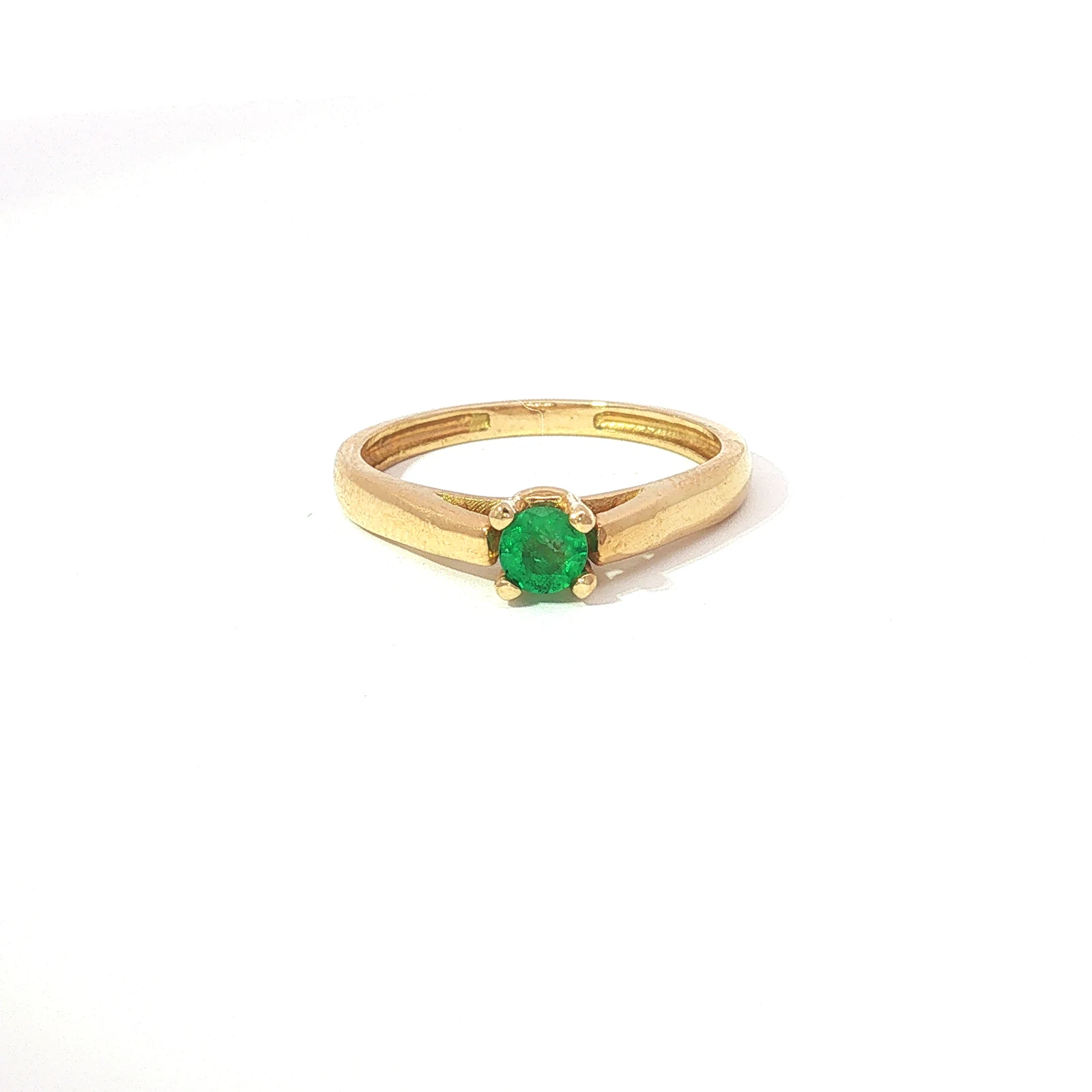 Anillo solitario de esmeralda redonda