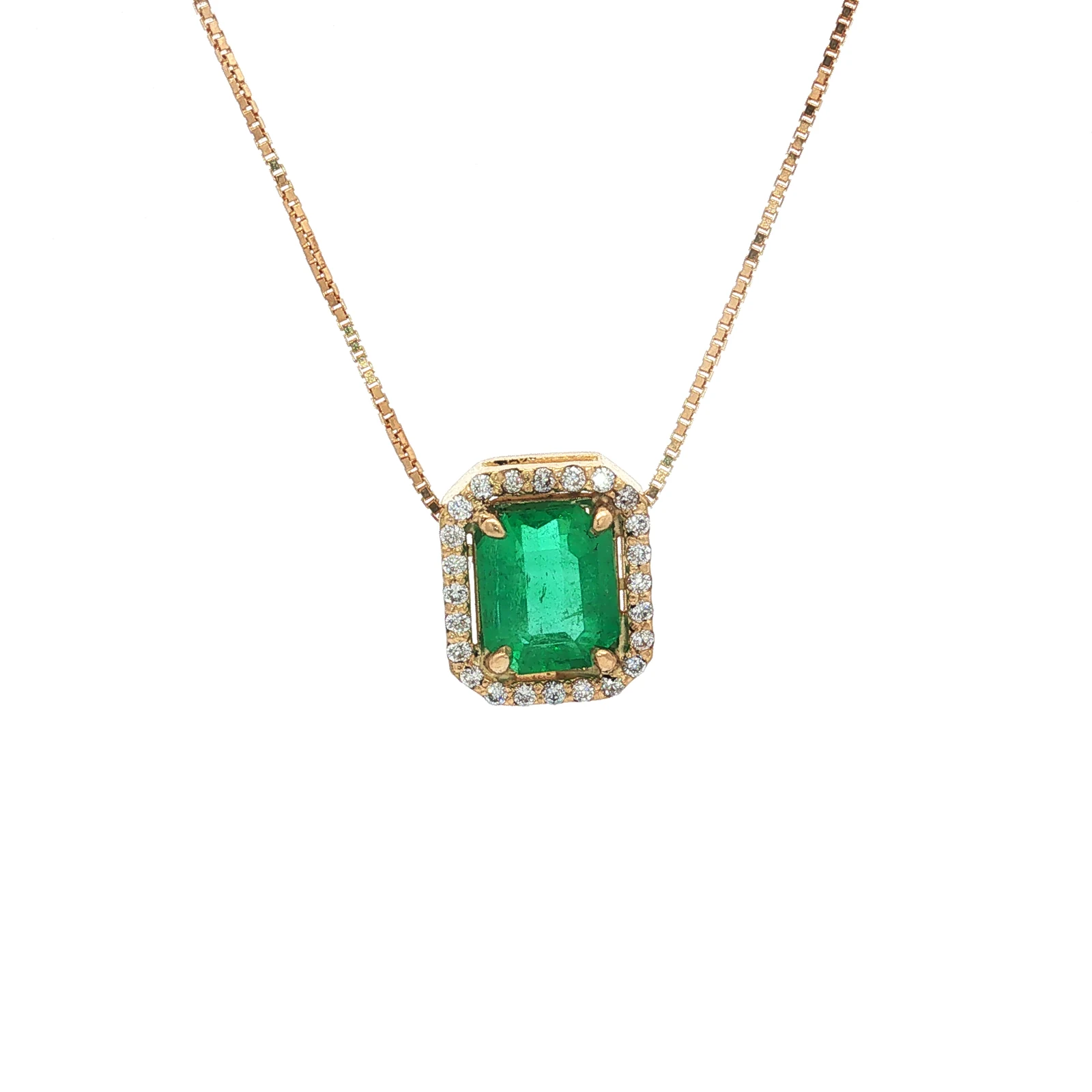 Dije de esmeralda rectangular con halo